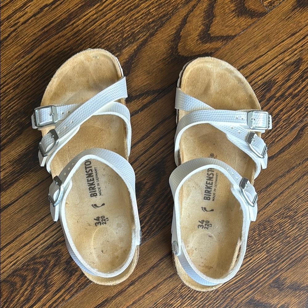Birkenstock White Sandals with Adjustable Straps and Ergonomic Footbed